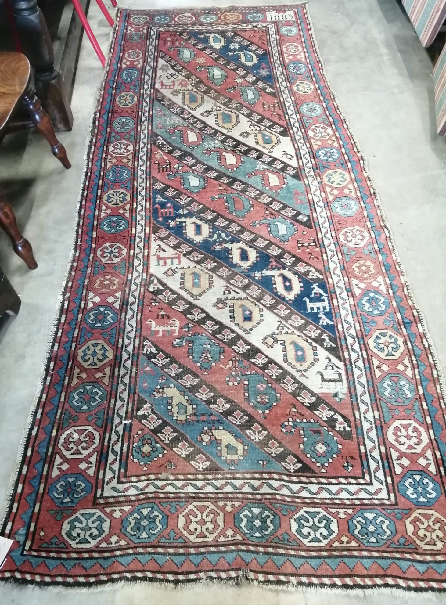 An antique Talish boteh rug, 273 x 108cm *Please note the sale commences at 9am.